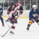 High school hockey player shooting